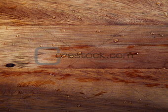 Wooden kitchen board with water drops