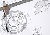 Compass and ruler on the drawing