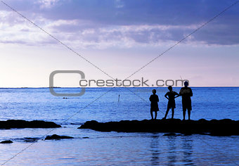 Three young fishermen