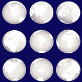 Set of silver Earth globes