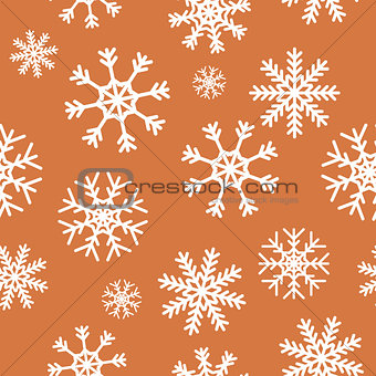 White snowflakes on brown background