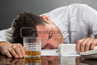 Sleeping man with drinking problems