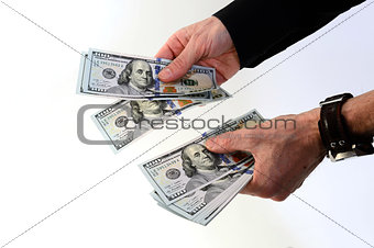 Hands holding a lot of money