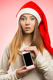 christmas girl with smartphone 