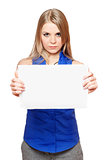Serious young blonde holding empty white board