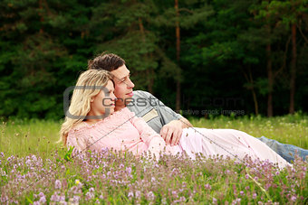 Young beautiful couple in love outdoors
