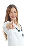 Beautiful female doctor pointing at camera