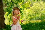little girl with soap bubbles