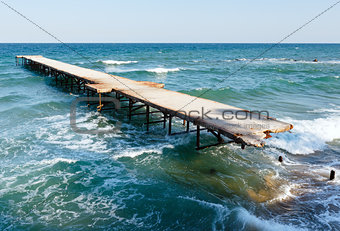 Ruined pier and evening Black Sea (Bulgaria).