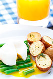 Poached egg with french beans and baked potato