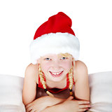 Smiling girl in Santa hat