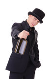 Retro stylish man in black suit with bottle of drink 