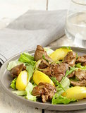 gourmet salad with a roasted chicken liver and apple