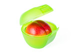 Red peach in green lunch box
