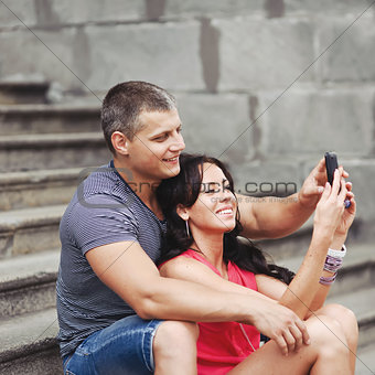 Romantic couple making picture of themselves