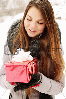 girl holding a gift