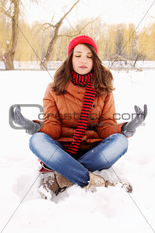 young woman in a lotus position