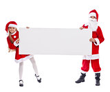 Santa and helper showing blank sign