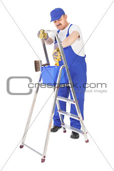 house painter and ladder