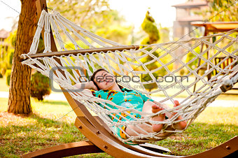 Woman on hammock.