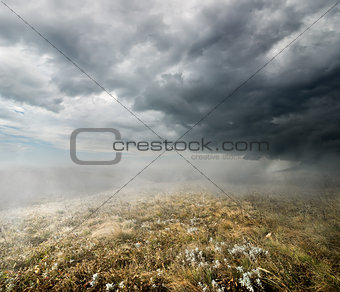 Clouds over the autumn field