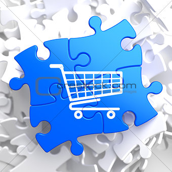 Shopping Cart Icon on Blue Puzzle.