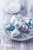Christmas ornaments on a silver plate