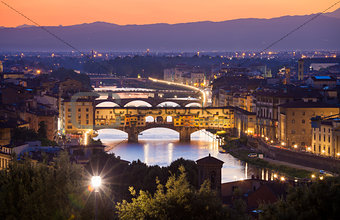 Ponte Vecchio night view over Arno  river in Florence