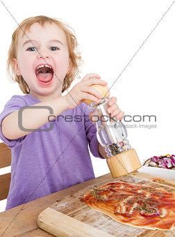 happy child making pizza