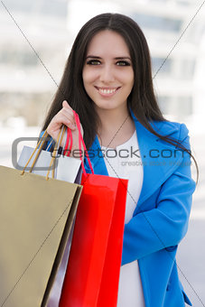 Girl with Shopping Bags Smiling