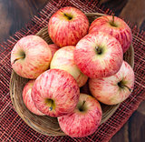 Fresh red apples in a basket