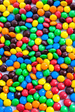 Multi colored candy drops as a background 