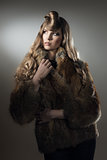 female with warm fur in fashion portrait 