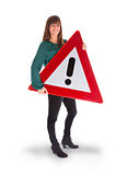 Concept of caution - Woman standing with caution sign