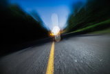 Blurry Road at Night. Drunk Driving, Speeding or Being too Tired