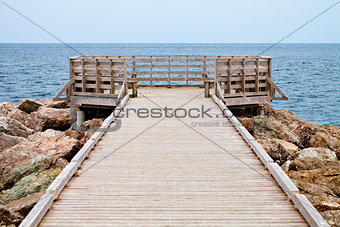 Long Wooden Dock with Observatory and View of the Ocean