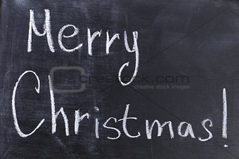Merry Christmas text on chalkboard