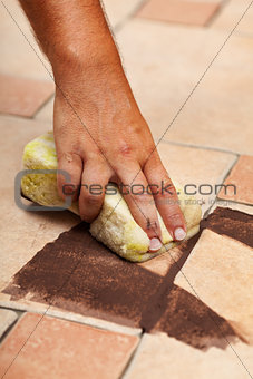 Testing the color of joint on ceramic floor tiling