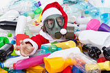 Toxic christmas - santa drowning in plastic bottles