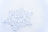 Christmas Background with Beautiful Snowflake on the Snow