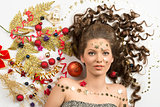 beauty christmas girl with creative decorations 