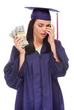 Stressed Female Graduate Holding Stacks of Hundred Dollar Bills