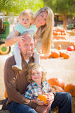 Attractive Family Portrait at the Pumpkin Patch 