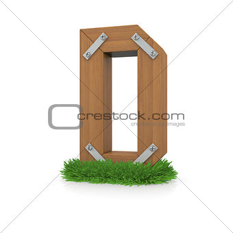 Wooden letter D in the grass