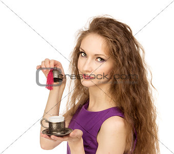 Young happy woman holding a coffee cup isolated