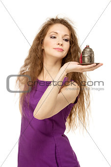 Young happy woman holding a coffee cup isolated