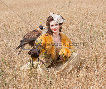 Woman with hawk on hand