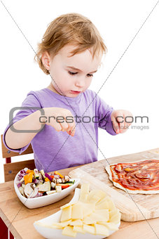 homemade pizza by a cute little girl