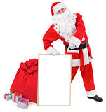 Santa claus shows blank white board 