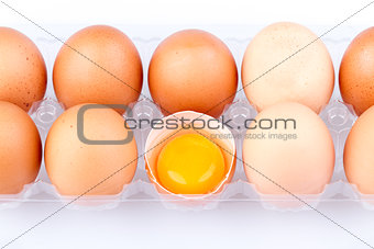 Eggs and yolk in a plastic transparent package 